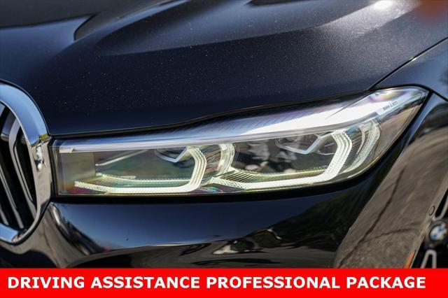used 2022 BMW 750 car, priced at $49,467
