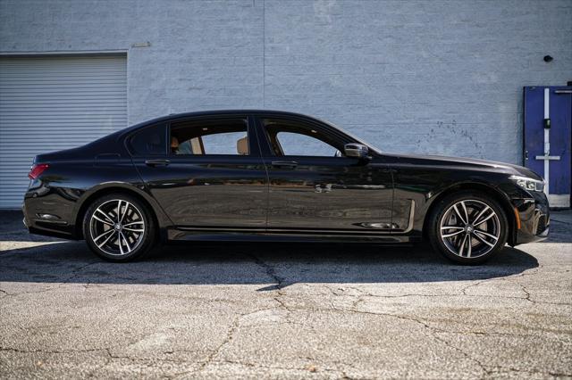 used 2022 BMW 750 car, priced at $49,467
