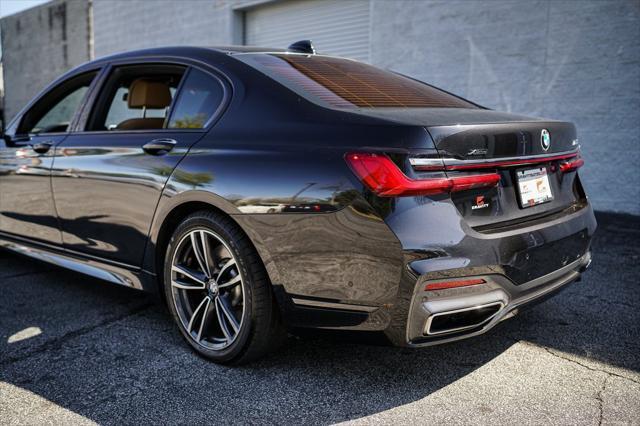 used 2022 BMW 750 car, priced at $49,467