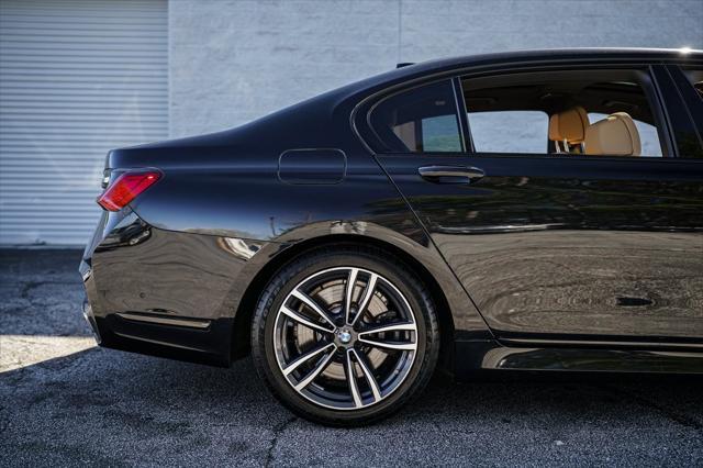 used 2022 BMW 750 car, priced at $49,467