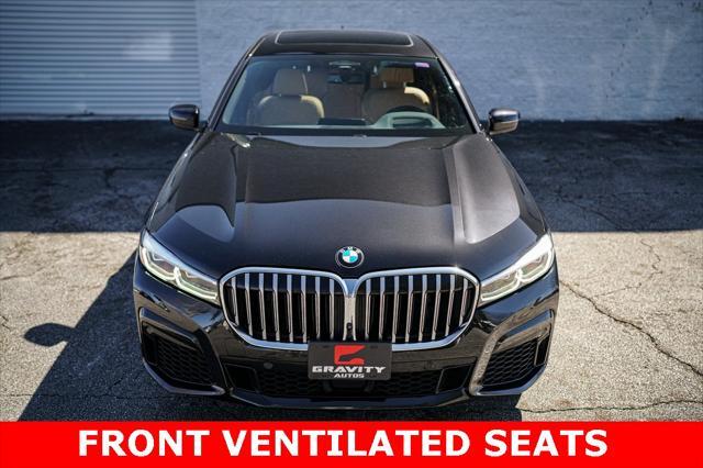 used 2022 BMW 750 car, priced at $49,467