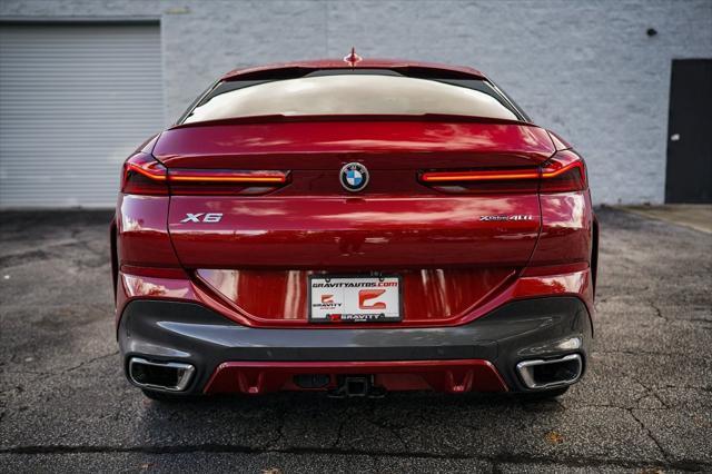 used 2022 BMW X6 car, priced at $53,997