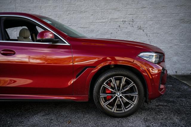 used 2022 BMW X6 car, priced at $53,997