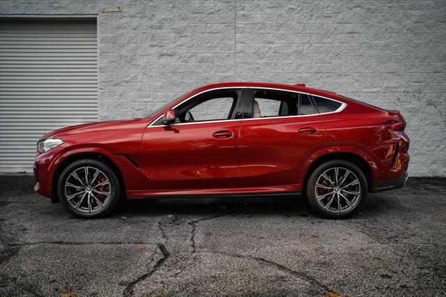 used 2022 BMW X6 car, priced at $53,997