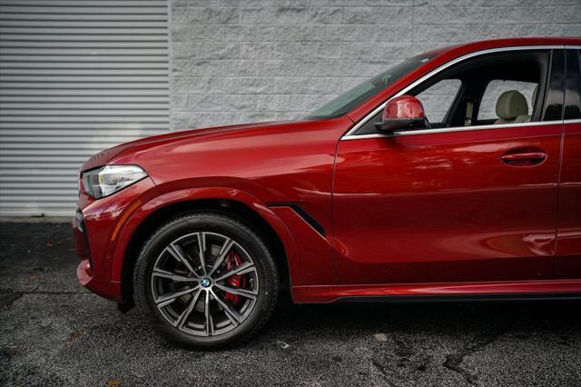 used 2022 BMW X6 car, priced at $53,997