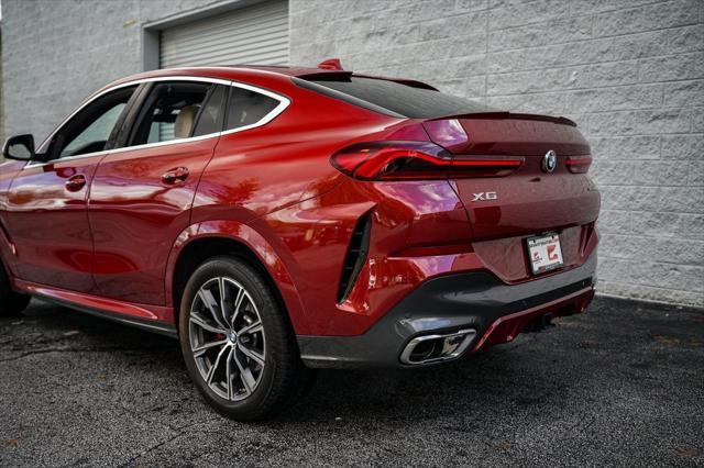 used 2022 BMW X6 car, priced at $53,997