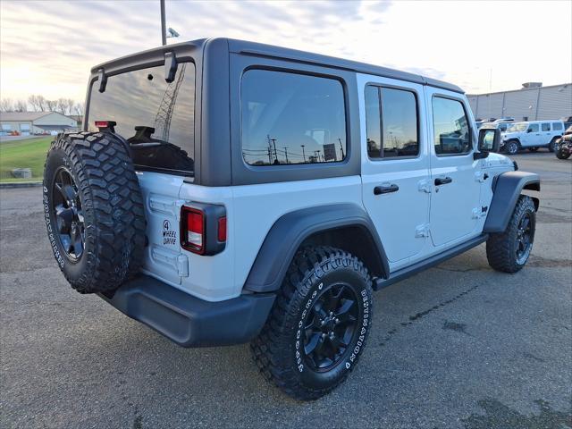 used 2021 Jeep Wrangler Unlimited car, priced at $34,987