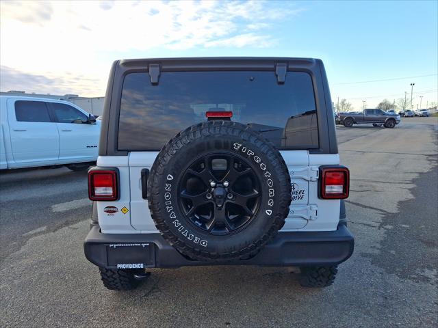 used 2021 Jeep Wrangler Unlimited car, priced at $34,987