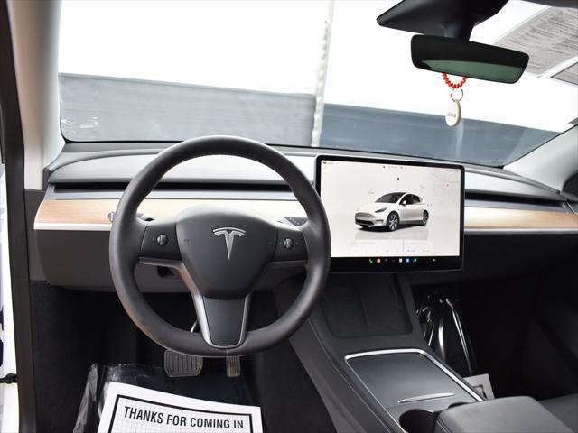 used 2023 Tesla Model Y car, priced at $29,999