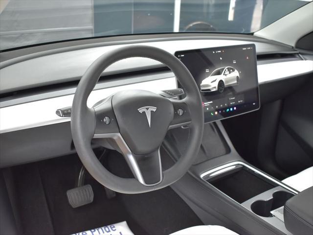 used 2023 Tesla Model Y car, priced at $29,999