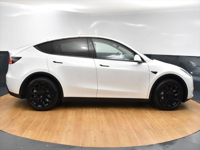 used 2023 Tesla Model Y car, priced at $29,999