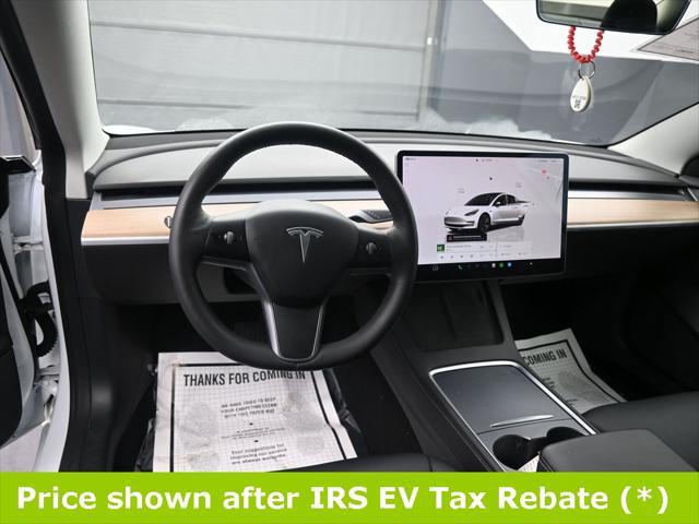 used 2022 Tesla Model 3 car, priced at $15,999