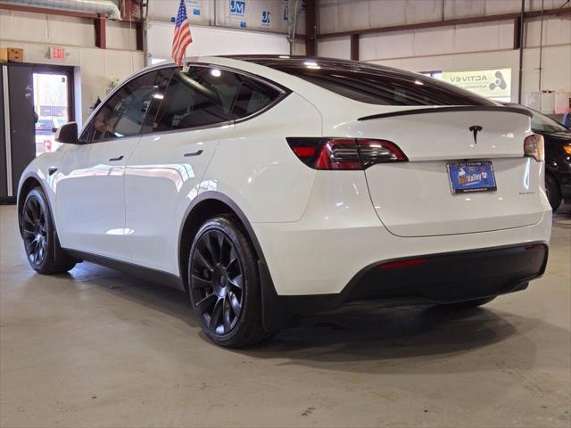 used 2023 Tesla Model Y car, priced at $35,880