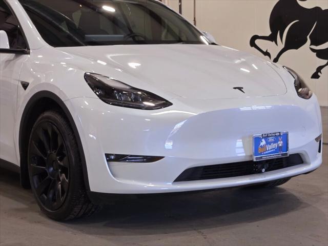 used 2023 Tesla Model Y car, priced at $35,880