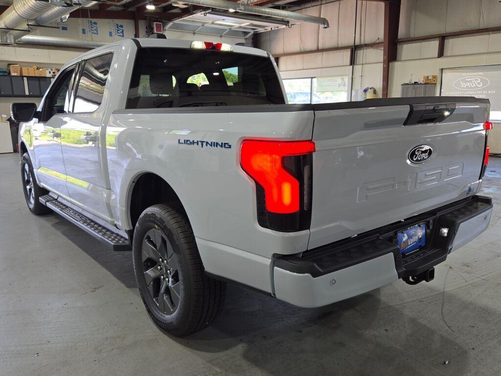 new 2025 Ford F-150 Lightning car, priced at $73,180