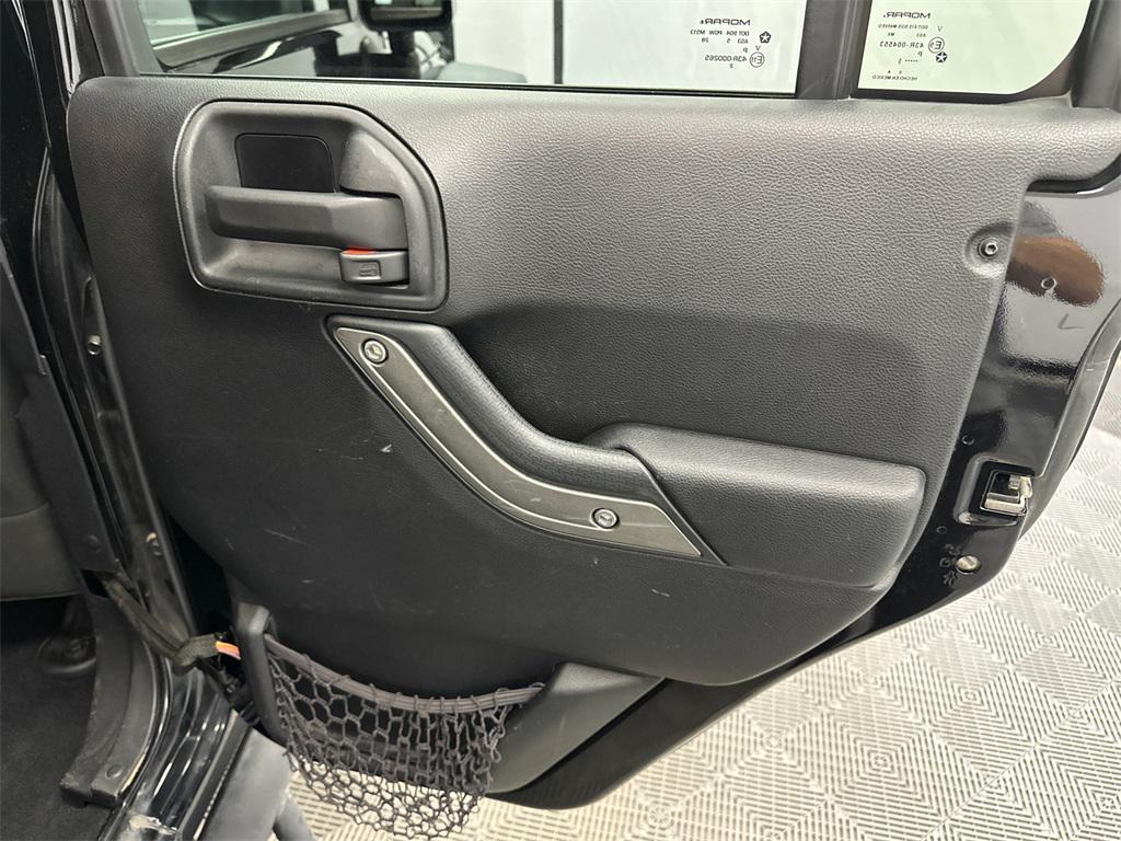 used 2015 Jeep Wrangler Unlimited car, priced at $14,850
