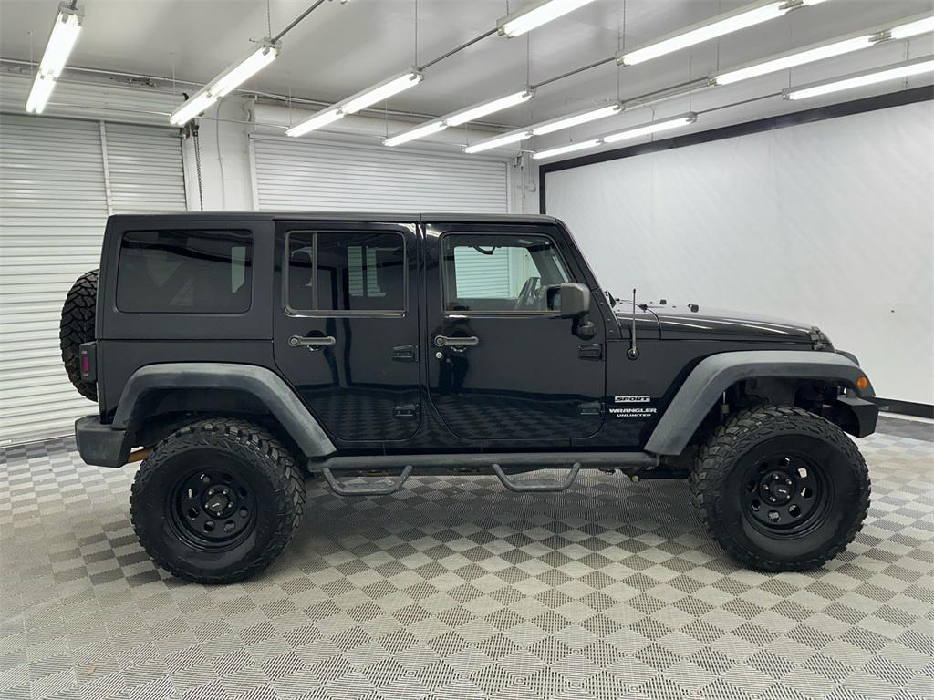 used 2015 Jeep Wrangler Unlimited car, priced at $14,850