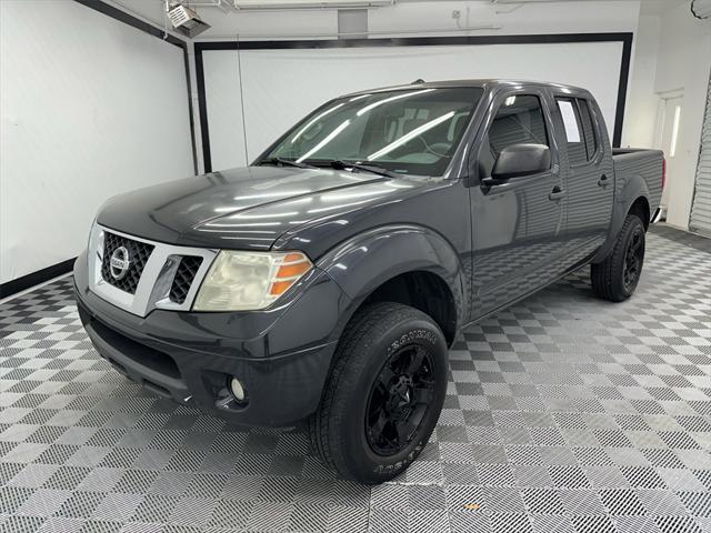 used 2014 Nissan Frontier car, priced at $10,471