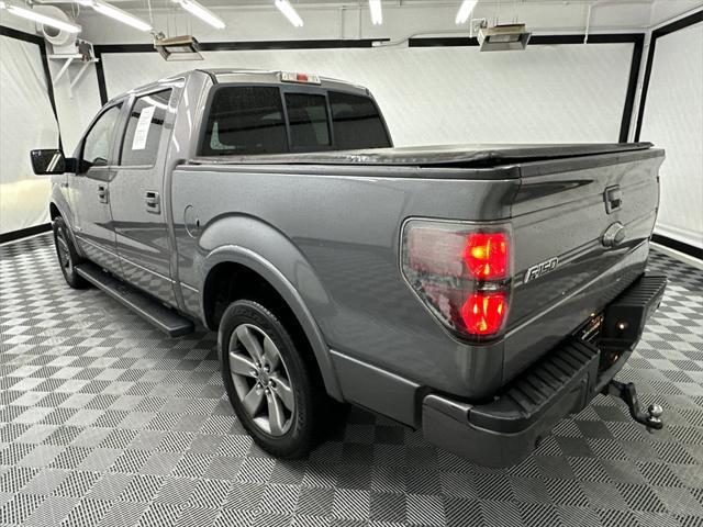 used 2014 Ford F-150 car, priced at $12,697