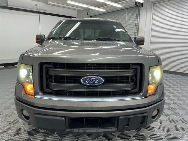 used 2014 Ford F-150 car, priced at $12,697