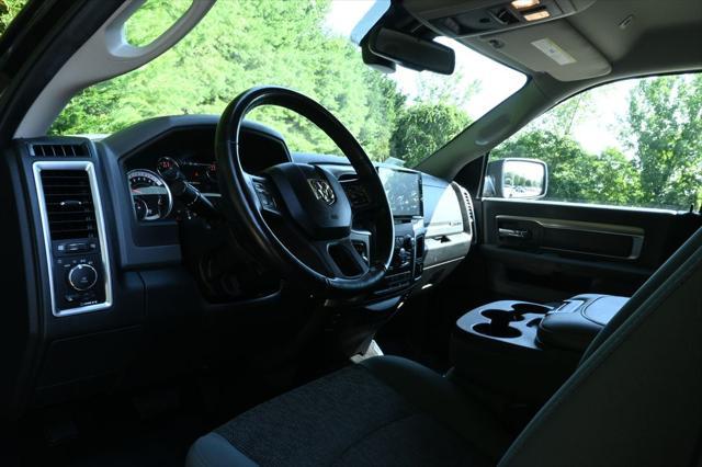 used 2018 Ram 1500 car, priced at $23,599