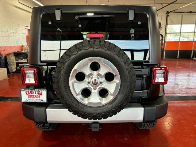 used 2014 Jeep Wrangler Unlimited car, priced at $17,893