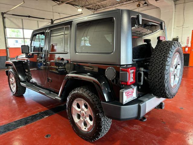 used 2014 Jeep Wrangler Unlimited car, priced at $17,893