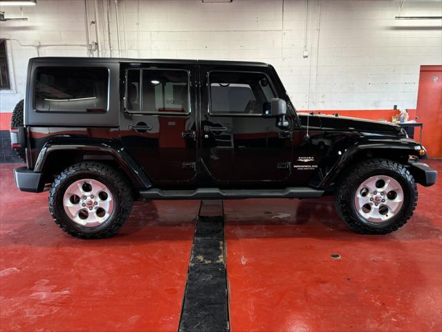 used 2014 Jeep Wrangler Unlimited car, priced at $17,893