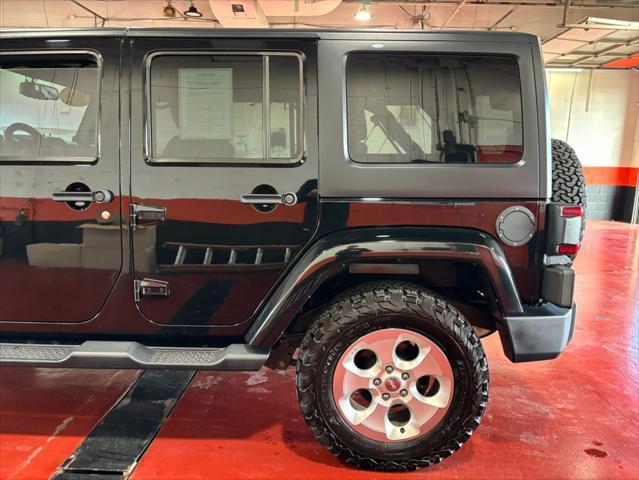 used 2014 Jeep Wrangler Unlimited car, priced at $17,893