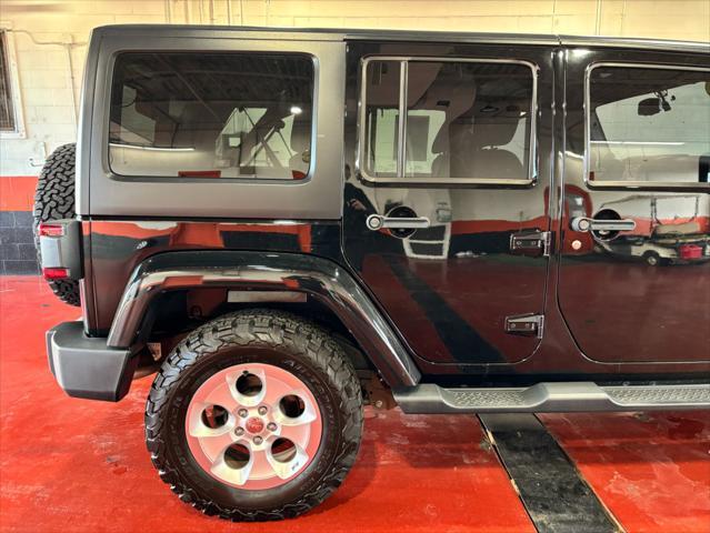 used 2014 Jeep Wrangler Unlimited car, priced at $17,893