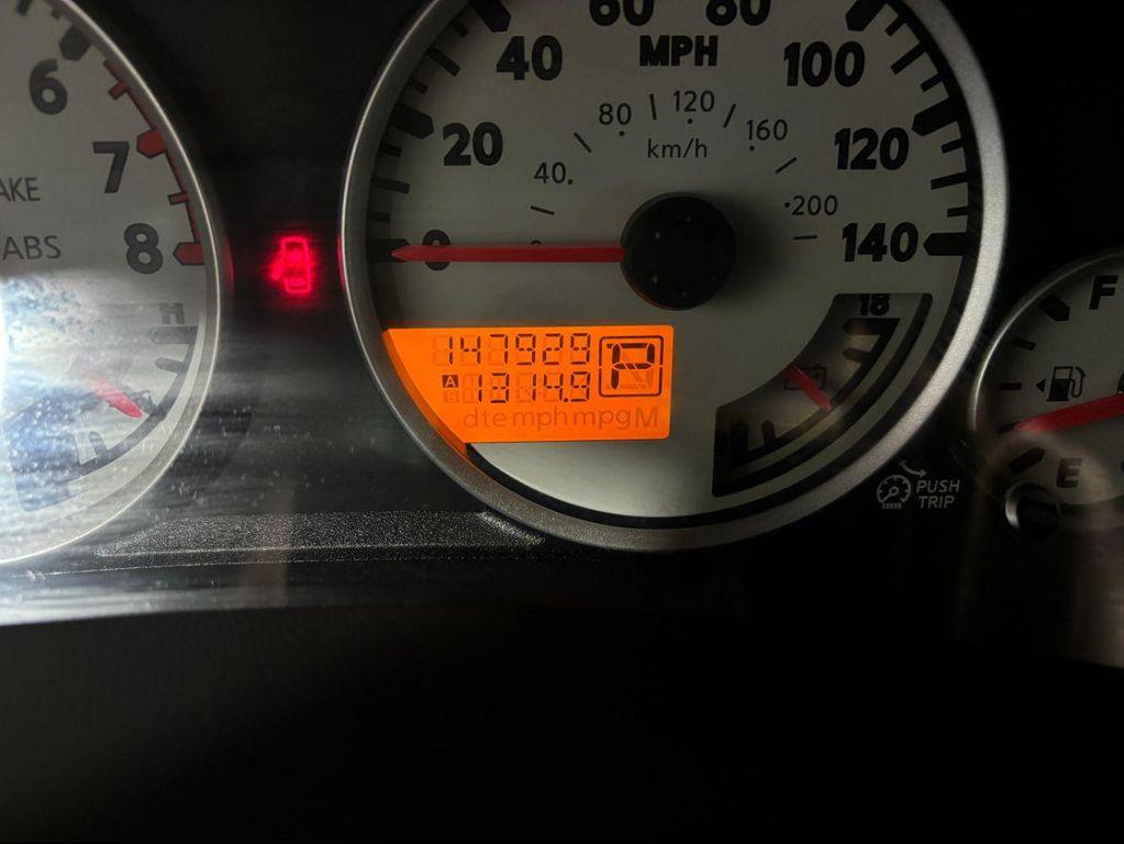 used 2011 Nissan Xterra car, priced at $11,687