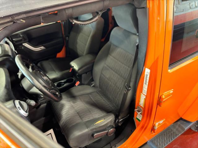 used 2012 Jeep Wrangler Unlimited car, priced at $16,233