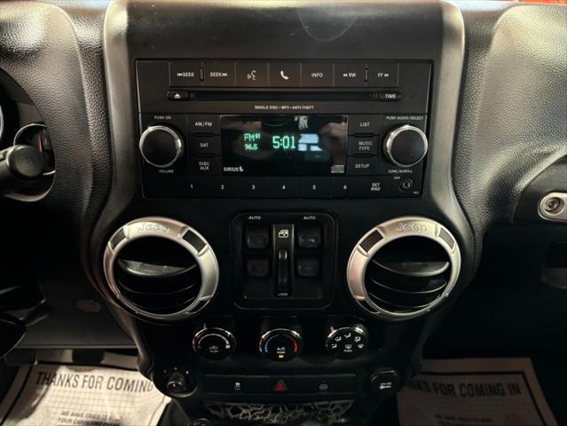 used 2012 Jeep Wrangler Unlimited car, priced at $16,233