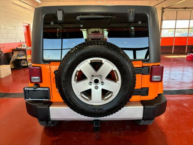 used 2012 Jeep Wrangler Unlimited car, priced at $16,233