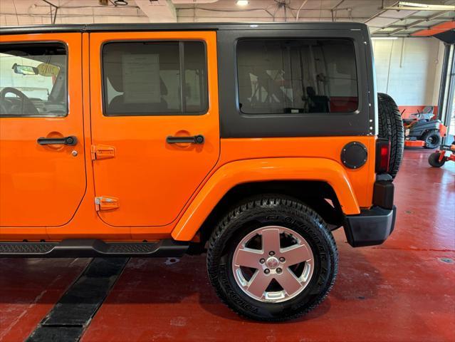 used 2012 Jeep Wrangler Unlimited car, priced at $16,233