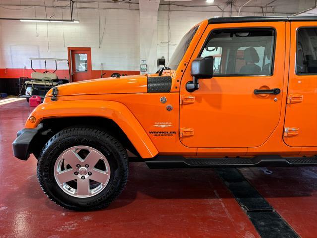 used 2012 Jeep Wrangler Unlimited car, priced at $16,233