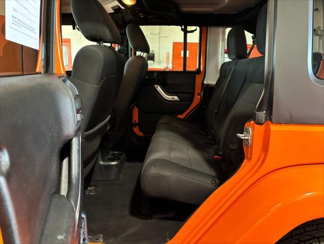 used 2012 Jeep Wrangler Unlimited car, priced at $16,233