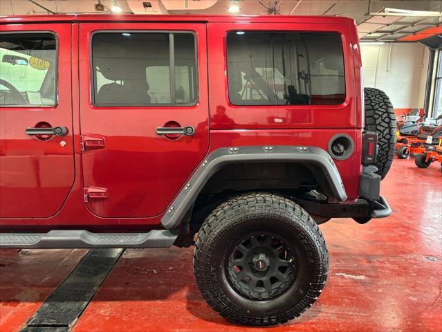 used 2012 Jeep Wrangler Unlimited car, priced at $16,577