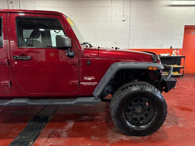 used 2012 Jeep Wrangler Unlimited car, priced at $16,577