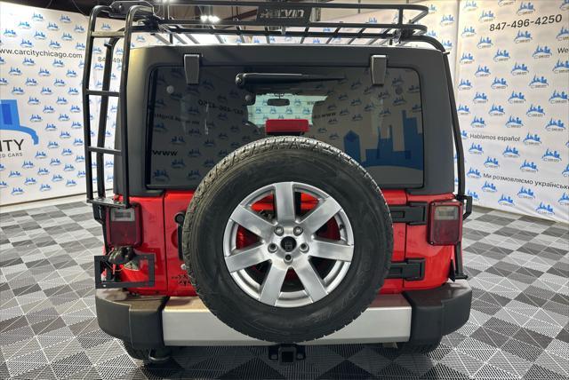 used 2013 Jeep Wrangler Unlimited car, priced at $16,990