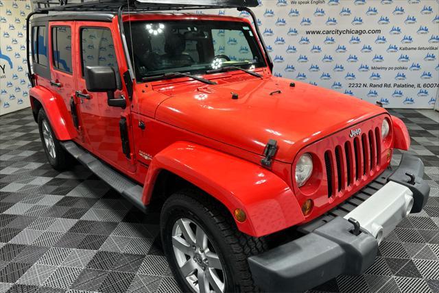 used 2013 Jeep Wrangler Unlimited car, priced at $16,990