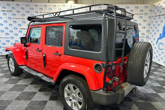 used 2013 Jeep Wrangler Unlimited car, priced at $16,990