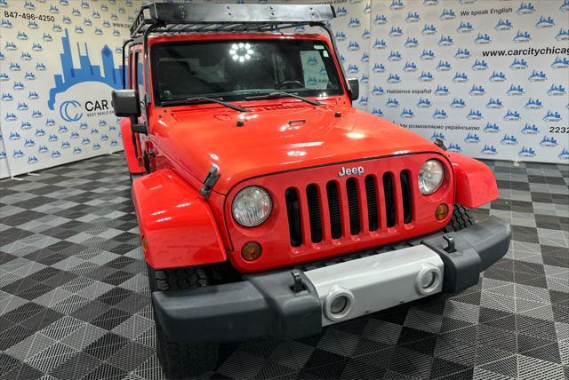 used 2013 Jeep Wrangler Unlimited car, priced at $16,990