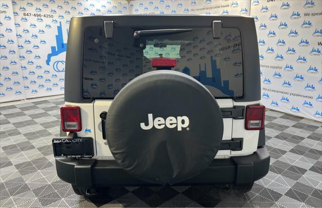 used 2012 Jeep Wrangler Unlimited car, priced at $15,990