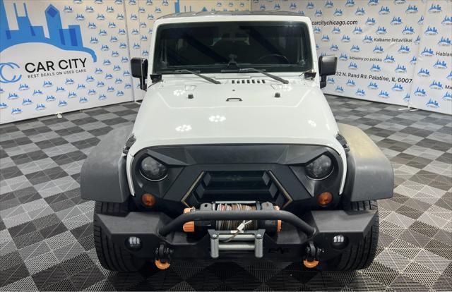 used 2012 Jeep Wrangler Unlimited car, priced at $15,990