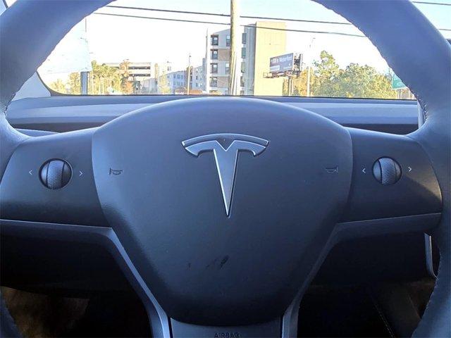 used 2023 Tesla Model Y car, priced at $28,029