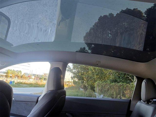 used 2023 Tesla Model Y car, priced at $28,029