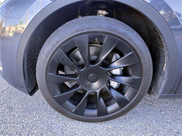 used 2023 Tesla Model Y car, priced at $28,029
