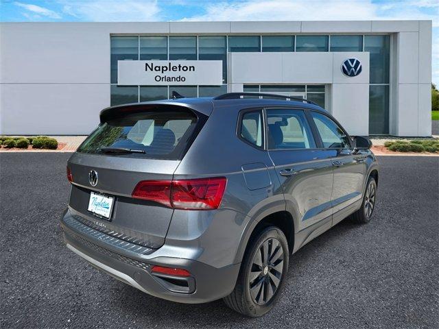 used 2023 Volkswagen Taos car, priced at $18,000