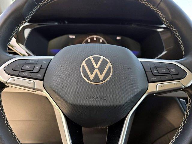 used 2023 Volkswagen Taos car, priced at $18,000